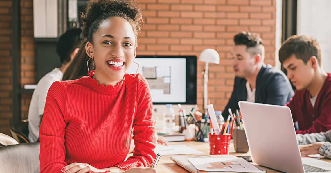 Office with 5 people engaged in their work